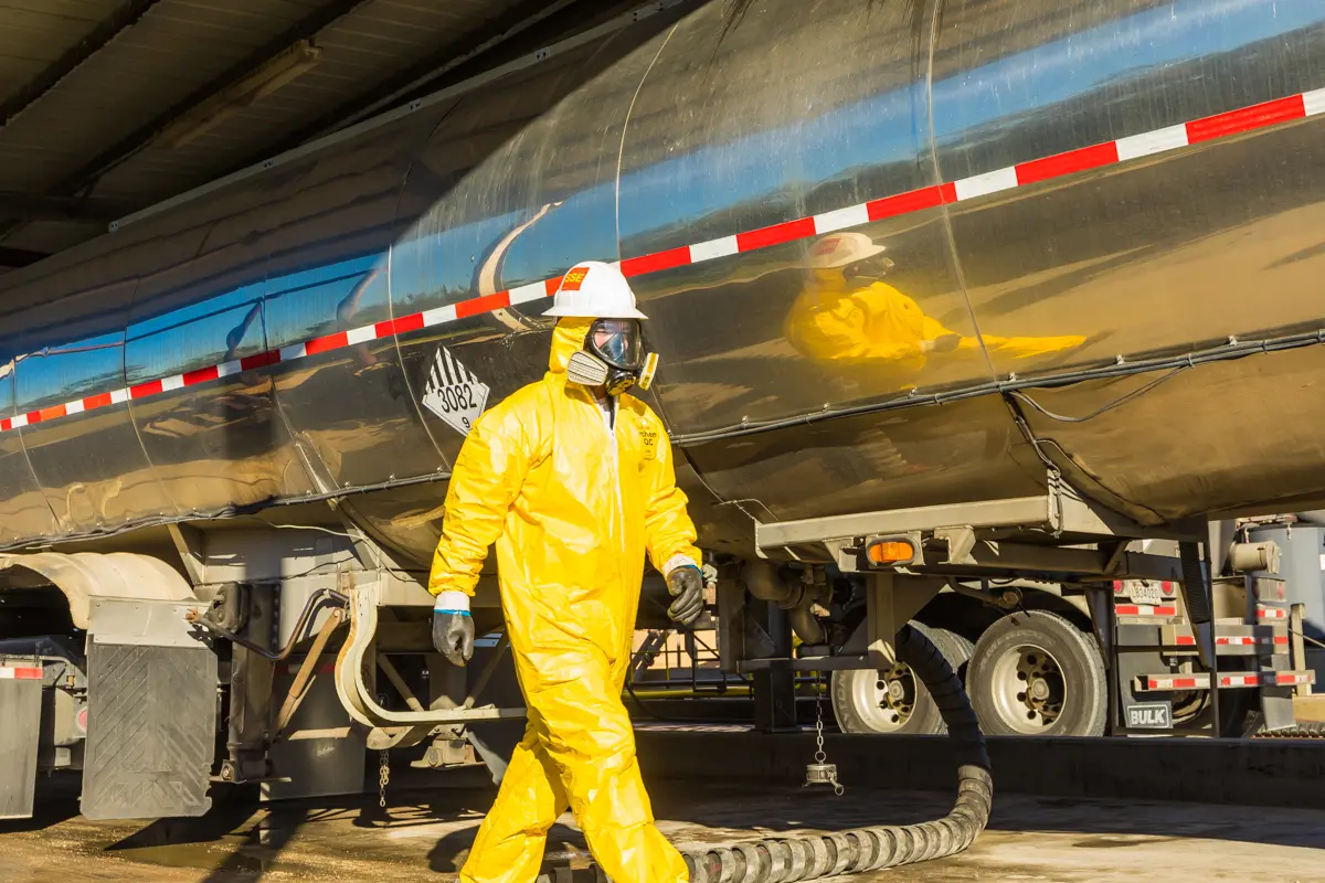 Ecoserv employee in hazmat suit